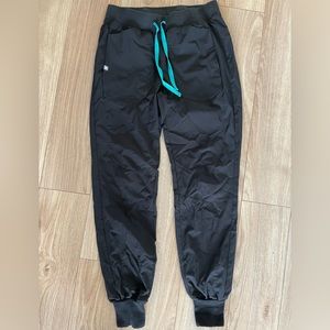 Figs scrubs, top and bottom. medium tall in the technical fabric (repels liquid)